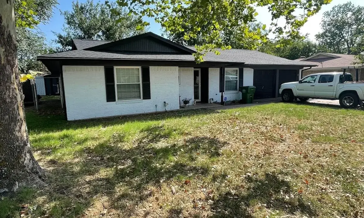Professional roofing crew working on a residential roof in Mount Vista